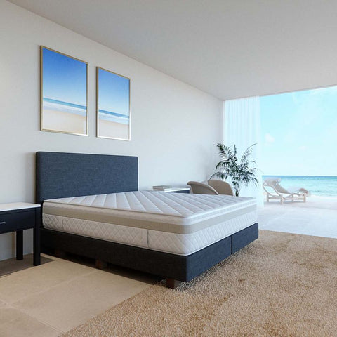 Excellence High-Class-Luxusmatratze auf einem modernen Boxspringbett in hellem Schlafzimmer für luxuriösen Schlafkomfort und erholsame Nächte.